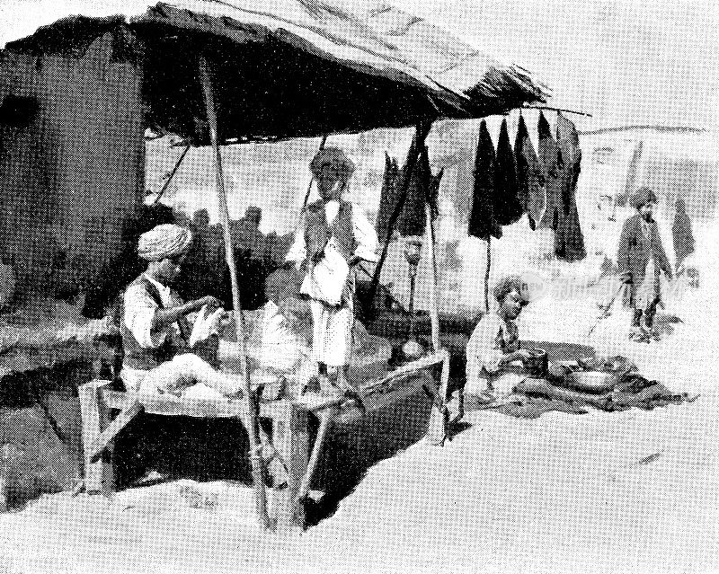 巴基斯坦拉合尔裁缝店的学徒- 19世纪英国殖民时代